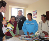 Some local Bolivian women and students Aimee Clark and Jon Gregg