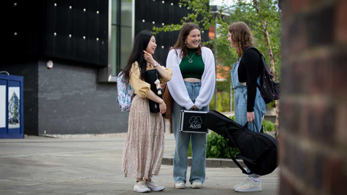 Students chatting outside 