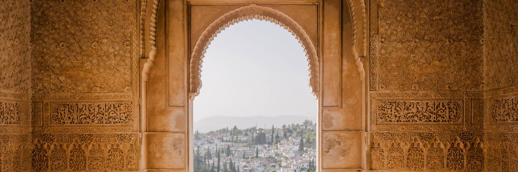 Spanish city through a door.