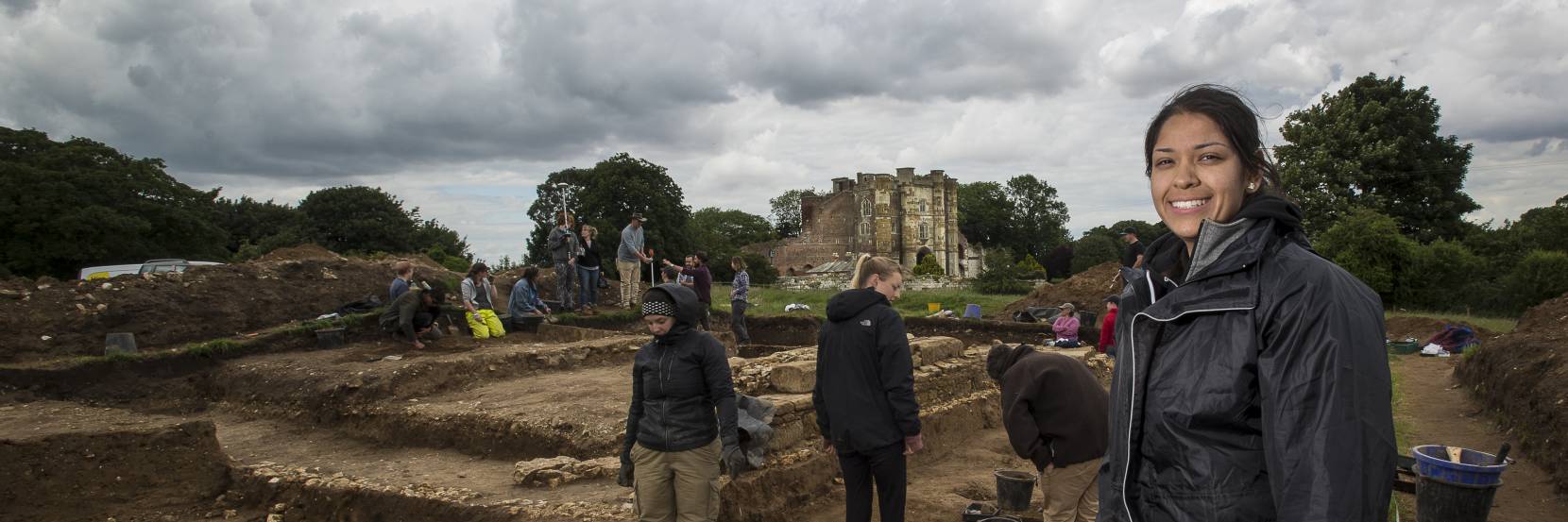 Archaeology students at a dig site.