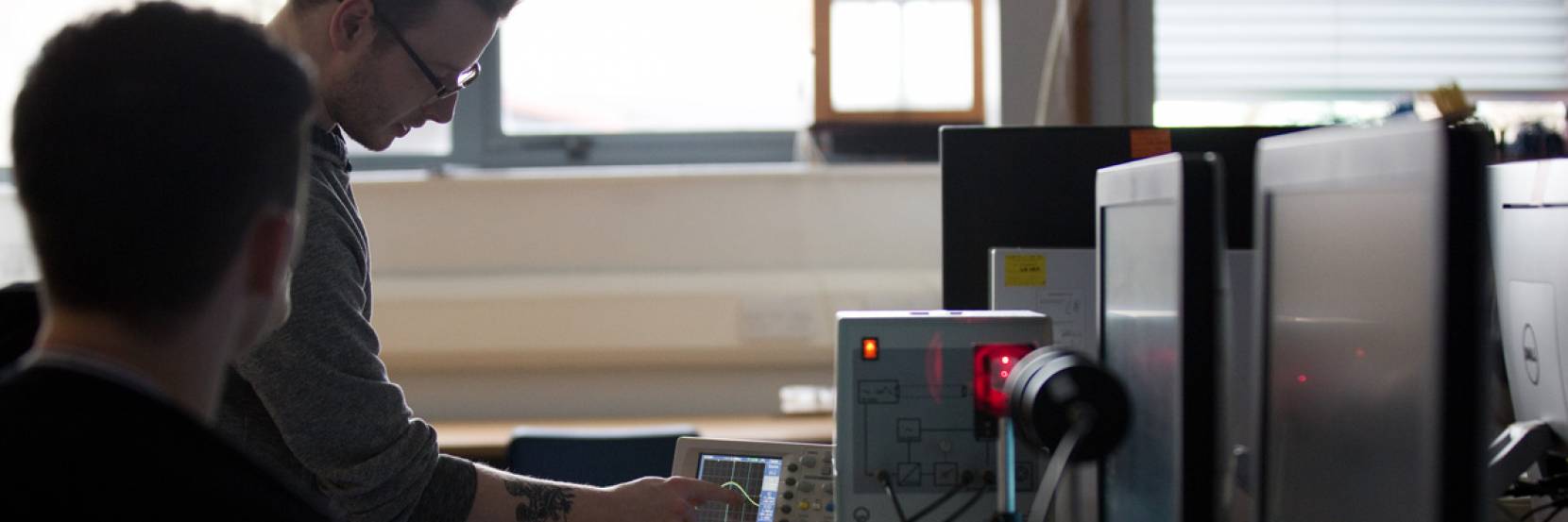 Students in a physics laboratory