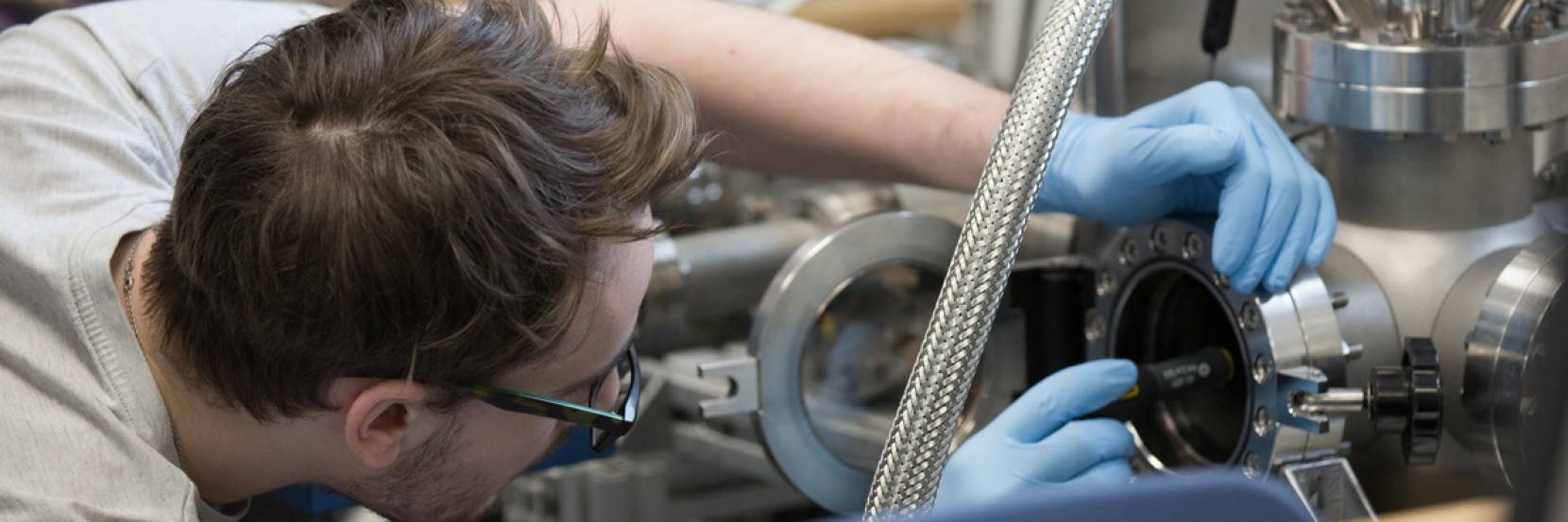 A student in a physics laboratory