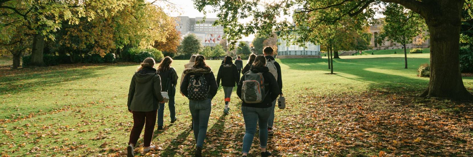 A group of students walking through Weston Park