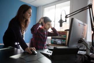 Image of postgraduate Journalism student with equipment