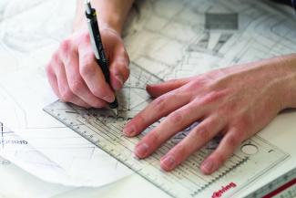Image of map and drawing equipment