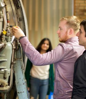 Three aerospace students on site