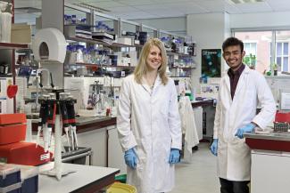Biomedical Science postgraduates in lab: Caroline Telfer and Chandresh Jain