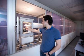 Chemstry postgraduate with equipment