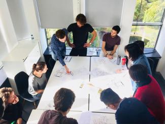 Architecture students working on live projects programme in studio