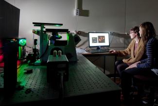 Biological Imaging postgraduates in lab