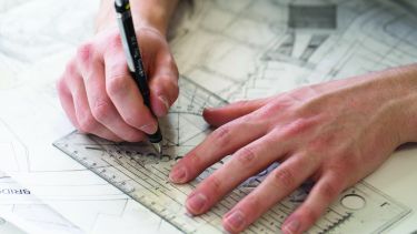 Image of map and drawing equipment