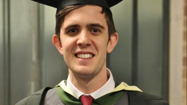 Postgraduate MA Commericial Real Estate graduate, Mark Ibbotson in graduation gown