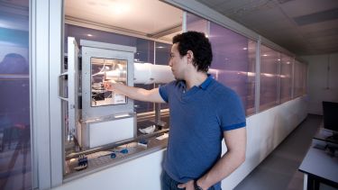 Chemstry postgraduate with equipment