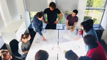 Architecture students working on live projects programme in studio