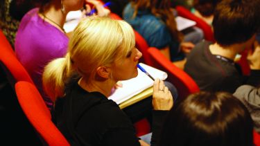 Law student at a lecture. 