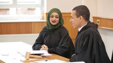 Students take part in a moot court.