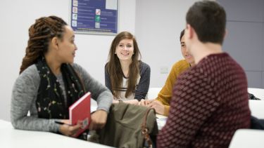 Students chat in seminar