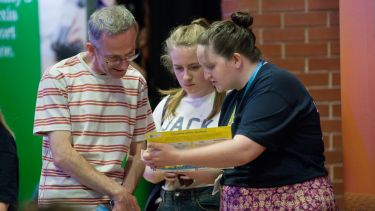 A student and dad at an open day. 