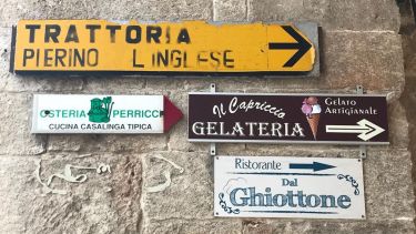 Signage on a wall in Italy.