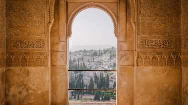 Spanish city through a door.