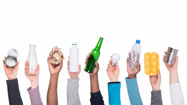 holding recyclables - environment header 