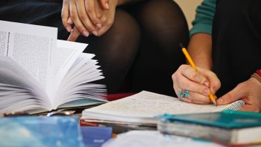 Students taking notes - image