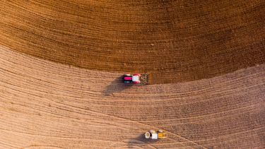 Tractor ploughing field