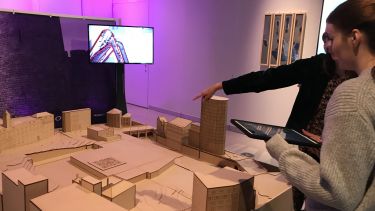 People viewing the model of Sheffield Castle using virtual reality