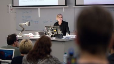 Academic presenting in a lecture theatre