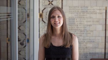 MA Sociology graduate Laura Towers stood in the Elmfield building