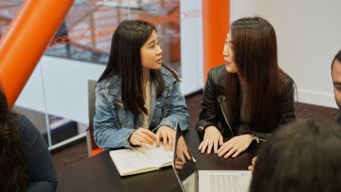 students in Diamond seminar/meeting room