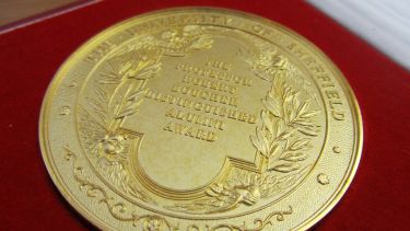 The Distinguished Alumni Award medal