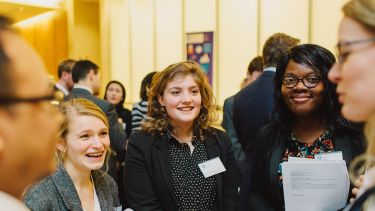 Students and alumni volunteers at a City Connections event