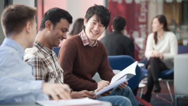 A group of students sat talking
