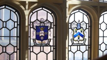 University Crest on stained glass window