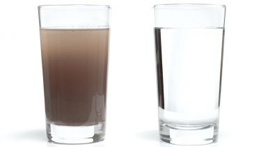 discoloured glass of water