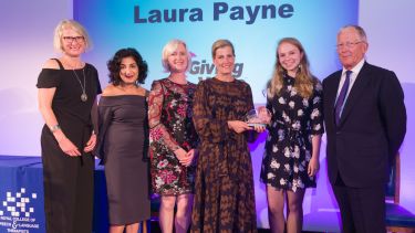 Laura Payne receiving her award
