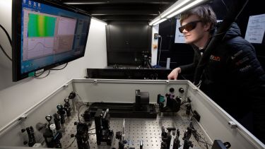 A researcher in the Ultrafast Laser Spectroscopy Laboratory