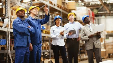 A group of construction workers and contractors gathered together - image