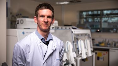 A neuroscience researcher in the lab