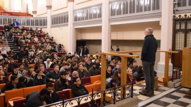 A speaker in St George's lecture theatre