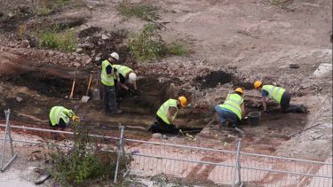 A team of archaeologists working at the Sheffield Castle dig site.