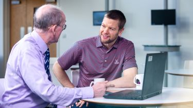 Executive Education tutor with student