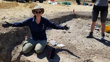 Archaeology student Kelsey at a dig site.
