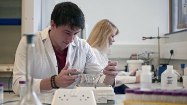 Man working in a Geography laboratory