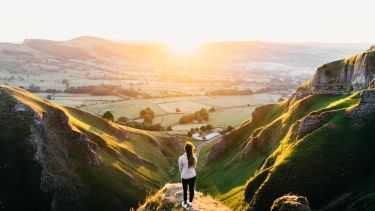 Student looks out at a valley in the Peak District