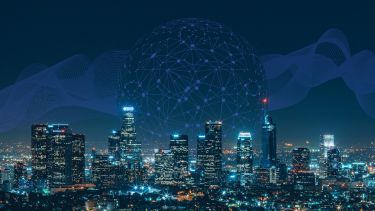 city skyline with networked globe at night time