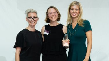 Madeleine Cullen, centre, with Laura Yeates, Head of Graduate Talent at Clifford Chance, and awards host Rachel Riley.