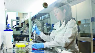 A female bioengineering student in a lab