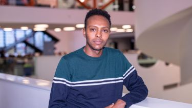 Student Tekle standing in the Diamond